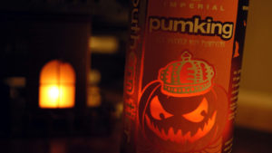 Photo of Pumking Ale bottle in low light. Hibernia now has Pumking Ale for a limited time.