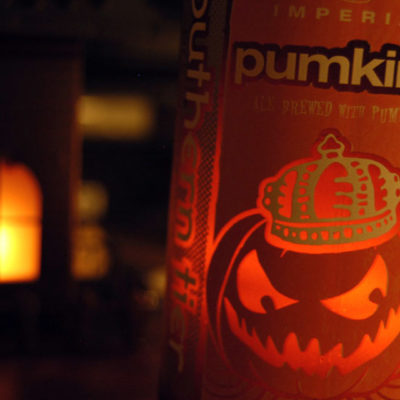 Photo of Pumking Ale bottle in low light. Hibernia now has Pumking Ale for a limited time.