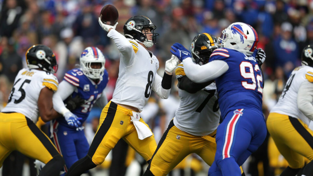 Image of Steelers QB Kenny Pickett throwing the football showing that he's one of the young Steelers showing promise this season.