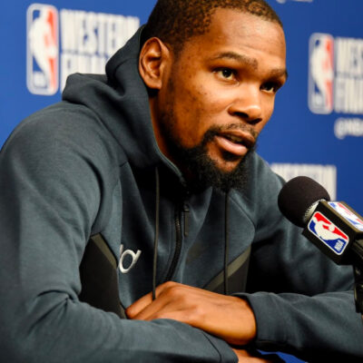 Photo of Kevin Durant at a press conference. In February the Nets traded Durant and Irving.